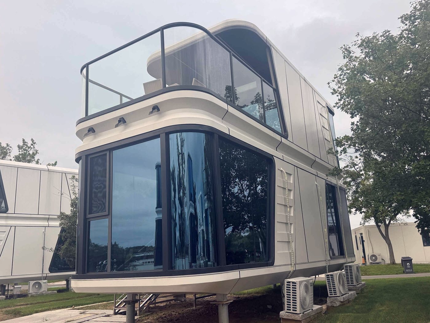 Two-storey capsule building, delivered and installed